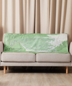 Nozawa Onsen ski map blanket displayed on sofa – cozy living room ski decor